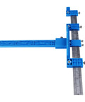 Nail Every Cabinet Hardware Job With Zero Sweat Using This Spot On Punch Locator Drill Guide Solid Aluminum Alloy Jig for Accurate Positioning in Door and Cabinet Fabrication, blue plastic jig with measurement marks.