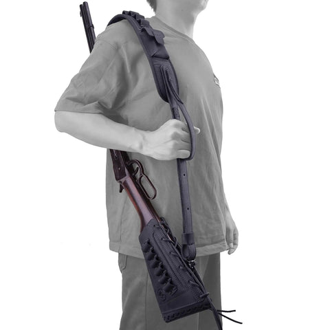 Person holding a rifle with a Rifle Buttstock Cover With Leather And Waxed Canvas Cushion, Matching Gun Sling, in black, side view.