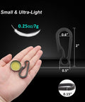 Black Titanium Carabiner Keychain With Quick Release Clip And Bottle Opener Small 2 Inch Key Clip shown in hand for scale
