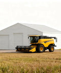 Heavy Duty Steel Barn Garage With Roll Top Metal Doors For Trucks Tractors Rvs Atvs And Workhorses Storage Shelter exterior view with tractor.