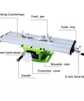 Mini Bench Drill Press Combo Machine With Lathe, Milling And Sanding Capabilities labeled components of a precision sliding table.