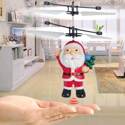 Hand Flying Ball Mini Induction RC Helicopter USB Rechargeable Toy Drone with Santa Claus design, hovering indoors