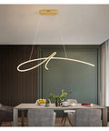 Premium Gold Led Pendant Light With Smooth Baked Varnish Iron Frame Dimmable Warm White Bulb Offering Heckin Sharp Illumination over a modern dining table.
