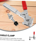 Rust-resistant iron toggle clamp with red ergonomic handle and rubber tips on wooden surface, ideal for workshops.