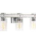 Gulliver Collection Three Light Clear Seeded Glass Coastal Bath Vanity Light In Galvanized Finish with whitewashed wood grain band.