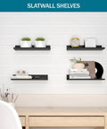 Heavy Duty Slatwall Shelves 6 Pack 12.5 Inch By 5 Inch Metal Wall Shelves For Garage, Retail, And Home Storage Black Finish Durable Steel Slat Wall Organizer Set installed on white wall holding decor items.