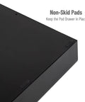 Close-up view of non-skid pads on the 36 Pod Single Serve Coffee Pod Drawer Organizer For Countertop Coffee Station Base, Holds Up To 36 Pods, Black Finish, Easy Access Storage For Your Pods, Space Saving Under Compatible Coffee Brewer.