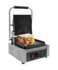 Heavy Duty 1800W Commercial Sandwich Panini Press Grill with sandwich loaded, showcasing stainless steel construction and adjustable temp control.