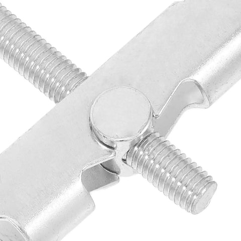 Close-up of metal toggle anchor from Heavy Duty Toggle Anchors Drywall Fastening Kit with metal locking nuts and washers.