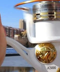Beefy Saltwater Spinning Reel With Anti Corrosion Coating 9Kg Drag 12 Plus 1 Stainless Bearings close-up of handle in use