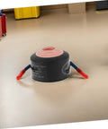 Road Ready Automatic Fire Extinguisher Featuring Sick Heavy Duty Back Adhesive For Car Engine Garage Home Safety Hella Solid Compact Aluminum Alloy Defense Pod on floor.