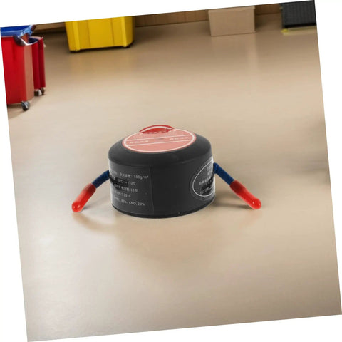 Road Ready Automatic Fire Extinguisher Featuring Sick Heavy Duty Back Adhesive For Car Engine Garage Home Safety Hella Solid Compact Aluminum Alloy Defense Pod on floor.