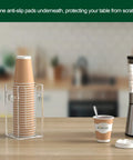 Disposable Coffee Cup Dispenser With Easy Grab Handles For Countertop Or Wall Mount Holds 3.54 Inch Dia Cups And Lids Up To 16 Oz Acrylic Lid Storage Organizer In Clear For Home Office Kitchen on a kitchen countertop.
