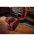 V20 Cordless 5 Inch Orbital Sander Bare Tool with 12,000 OPM on a workbench, showing lightweight low profile and dust bag