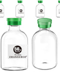 Eight 50ml clear glass vials with green caps; front-left shows ZHANXUBIO label.