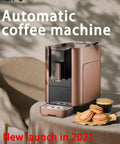Premium Silver Espresso Coffee Machine For Your Daily Grind Compact Kitchen Drip Brewer With One Touch Auto Start, compact design with espresso and cookies.