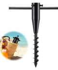 Heavy Duty Beach Umbrella Sand Anchor And Metal Stand For Outdoor Yard Garden Rust-Proof Ground Anchor Fits 1.3 To 2 Inch Poles No Dig Easy Install Portable Wind-Resistant Umbrella Base shown against a beach background.