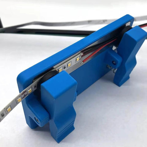 Blue soldering clamp for circuit boards and LED light panels, precision wire fixture for PCB assembly, heat-resistant welding station