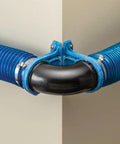 Close-up of Dust Right Ready-Mount 2.5 Inch Vacuum Hose Fitting Brackets with blue hose at corner for dust collection systems.