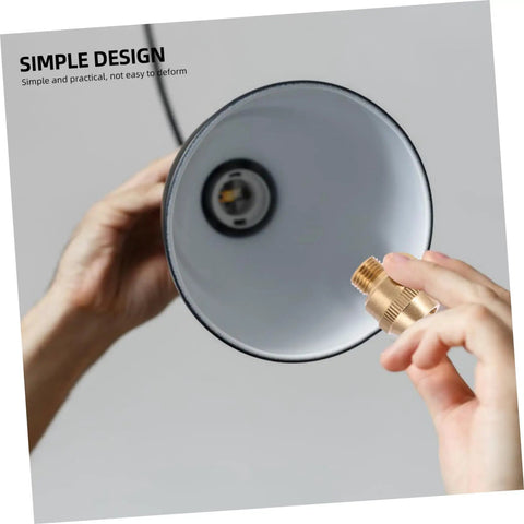 Solid Brass Cord Grip For Edison Style Pendant Lights, Threaded Cable Locker Strain Relief in hand next to lamp
