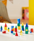 GeoSolids 3D Geometry Shapes Set For Hands On Learning Includes Cubes Cones Spheres Pattern Blocks And Colorful Solids Perfect Math Manipulatives For Homeschool And Classroom Builds Spatial Reasoning And Math Vocabulary Must Have, 32 colorful plastic shapes on table