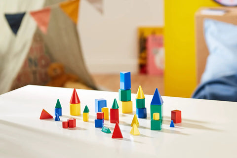 GeoSolids 3D Geometry Shapes Set For Hands On Learning Includes Cubes Cones Spheres Pattern Blocks And Colorful Solids Perfect Math Manipulatives For Homeschool And Classroom Builds Spatial Reasoning And Math Vocabulary Must Have, 32 colorful plastic shapes on table