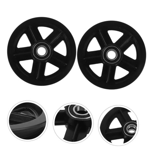 Heavy Duty Barn Door Roller Wheel Set Featuring Smooth Steel Casters For Sliding Gates And Windows High Load Rigid Track Hardware Built Like A Tank And Rust Resistant For Effortless Indoor Outdoor Setup, close-up of black steel casters.