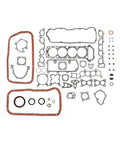 Complete Engine Overhaul Gasket And Seal Kit For Nissan D21 Pickup 2.4L KA24E with seals and gaskets arranged for installation.