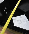 Open Black 20x16x10 Industrial Control Panel Enclosure NEMA 4 and 12 with measuring tape and instructions inside, durable steel, easy mount