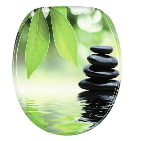 Prime Soft Close Toilet Seat With Adjustable Quick Release Hinges And Dead Quiet Slow Shut Action For A Durable Resin Bathroom Setup with leaf design and stacked stones.