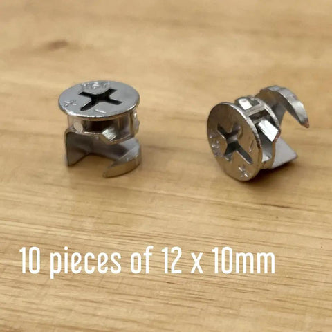 Two silver cam locks from 12 X 10mm Cam Lock Replacements Kit For Cabinets Dressers And Drawers on wooden surface