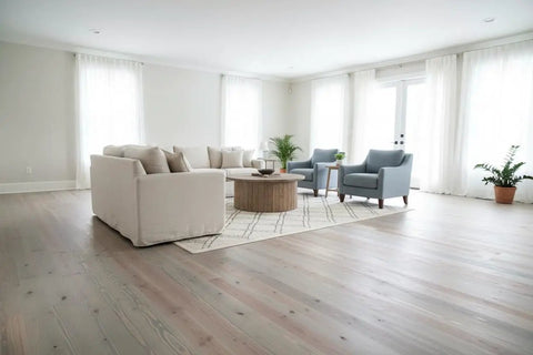 Pro Grade Reactive Water Based VOC Free Wood Stain For Pine Delivers A Sweet Rustic Weathered Gray Brown Look With Zero Sweat Application covering a light-filled living room with furniture.