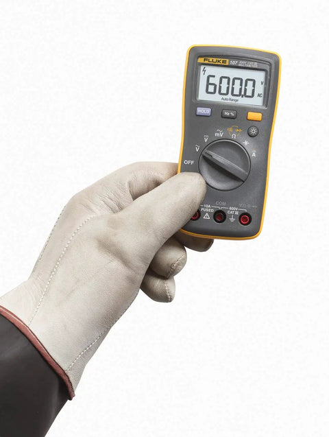 AC And DC Current Handheld Digital Multimeter With Backlit Display Pro Grade Tool for Quick Voltage and Current Readouts in gloved hand