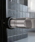 Close-up of Beast Mode Heavy Duty 6 Piece Pipe Extractor Set for Damaged Threads, mounted against a tiled wall, showing metal tip.