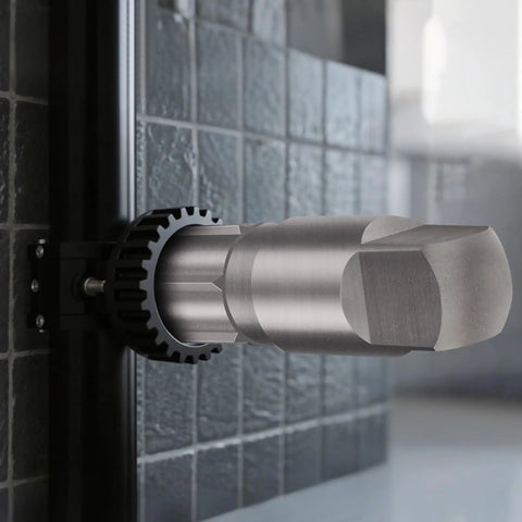 Close-up of Beast Mode Heavy Duty 6 Piece Pipe Extractor Set for Damaged Threads, mounted against a tiled wall, showing metal tip.