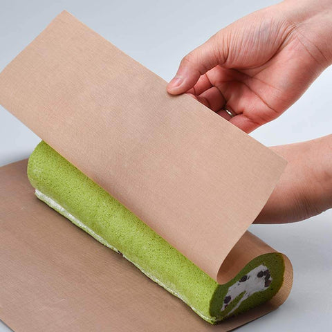 Eight Sheets PTFE Teflon Sheet for Heat Press Transfers shown with green roll, demonstrating nonstick surface and flexibility.