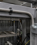 Ironclad Flex Gray Conduit 64mm X 10M Thickened Wire Cable Protector Sleeve in industrial wiring setup.
