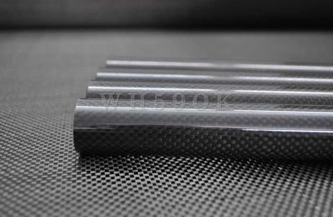 Roll Wrapped Carbon Fiber Tube 6mm Outer Diameter 5mm Inner Diameter 1000mm Length 3K Gloss Plain Finish Two Piece Pack Japan Import Quality For DIY Projects Built Tough stacked on carbon fiber surface