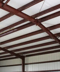 Top Shelf 2 Inch Fiberglass Insulation Roll With Psk Facing For Metal Buildings And Pole Barns No Sweat Condensation Control Duct Wrap Ready installed in metal building ceiling.