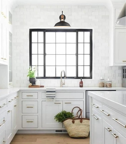 Modern kitchen featuring 2 Pack Farmhouse Plug In Wall Sconces with Gooseneck Arms and Barn Shade Matte Black Finish and Brass Heads.