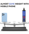 Image of a 4V Cordless Electric Screwdriver With LED Light 2000mAh USB Rechargeable Battery on a scale next to a smartphone.
