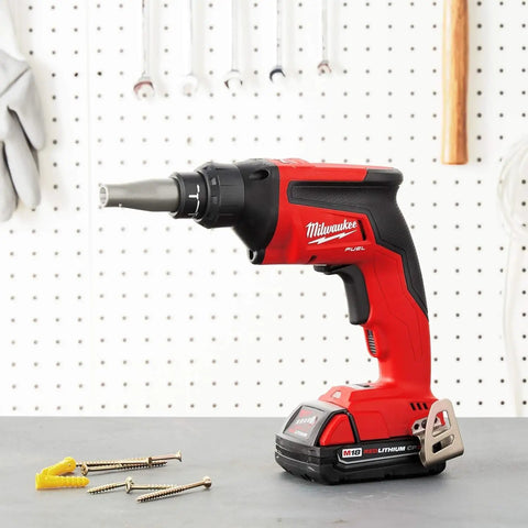 M18 Fuel Drywall Screw Gun Bare Tool with Auto Start Mode and Powerstate Brushless Motor placed on a workbench.