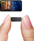 Smallest Wireless WiFi Hidden Camera With 1080P HD Video Live Feed Portable Nanny Cam shown between fingers with video display