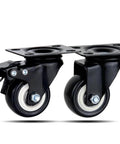 Close-up of Beefy Heavy Duty Caster Wheels with brakes, featuring black rubber wheels and metal mounting plates.