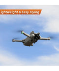 Drone in flight against a blue sky, showcasing Premium Carbon Fiber Propeller Blades Compatible with Mini 3 Pro and Mini 4 Pro Genuine 6030F Rotors Include Screwdriver Kit.