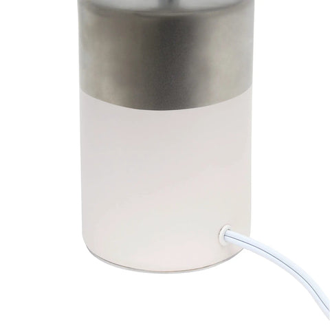 Close-up of the two-tone porcelain base of the Two Tone Porcelain Bedside Table Lamp With White Fabric Shade In Silver And Off White.