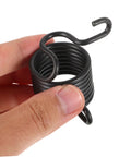 Close-up of black metal coil component from Heavy Duty Pneumatic Air Hammer Chisel Set With Drill Bits, Drift Pin, Punch And Rivet Tool Kit