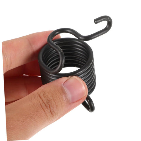Close-up of black metal coil component from Heavy Duty Pneumatic Air Hammer Chisel Set With Drill Bits, Drift Pin, Punch And Rivet Tool Kit