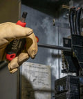 Using Tough As Nails T-Handle Hex Key Set With Stand, 10-Piece SAE Inch in an electrical panel, glove holding tool.