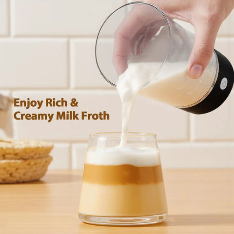 Pouring milk froth into coffee glass, showcasing Handheld Cold Foam Frother For Coffee Battery Powered With Two AA One Button Operation